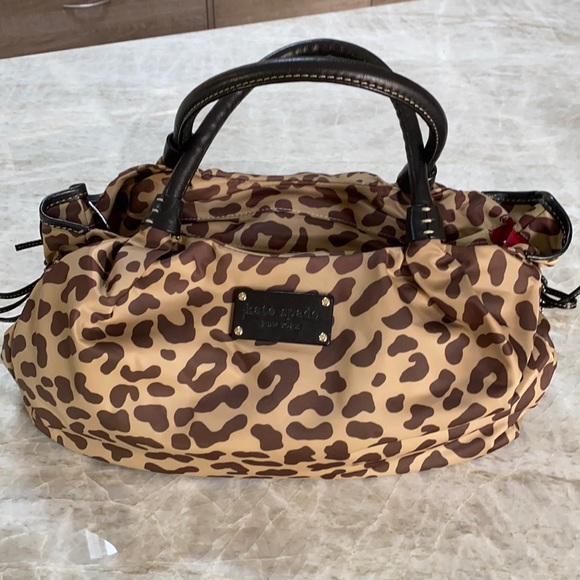 Kate Spade leopard material purse.